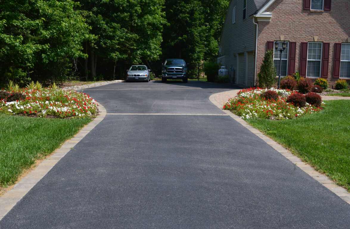 Newly installed concrete driveway with decorative edging in St. George, UT